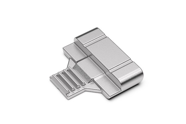 Metallbauteil mit strukturierten Rillen und präziser Oberfläche